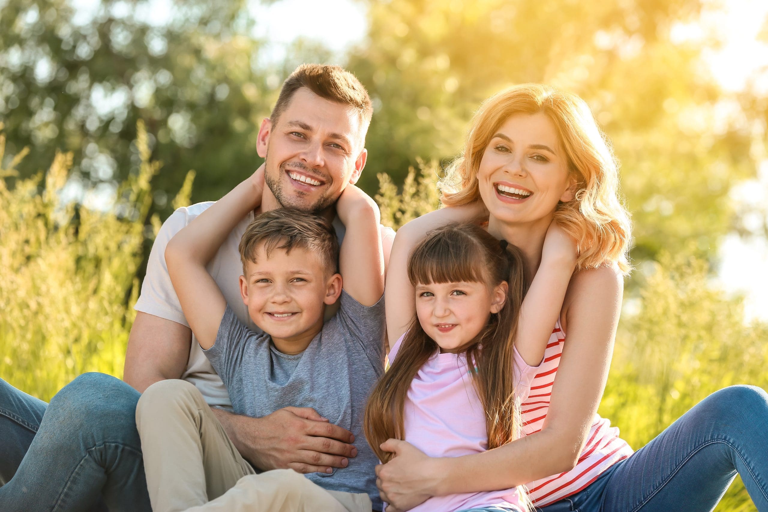 Happy family in park on summer day